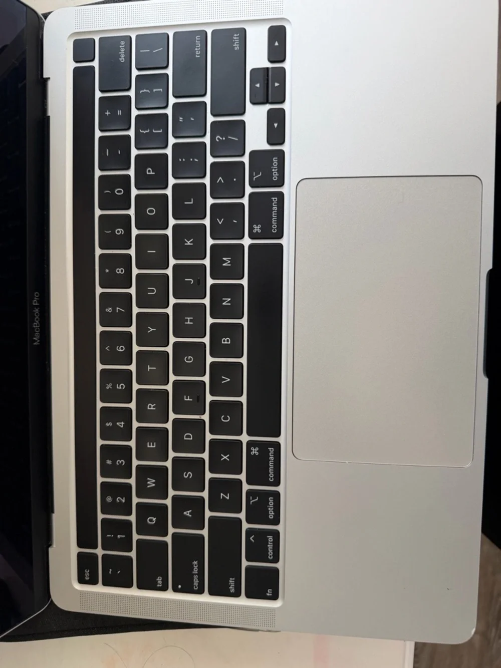 Apple MacBook Pro Silver with Black Keyboard and Dark Display